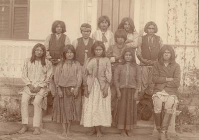 Chiricahua Apache children upon arrival at Carlisle Indian School from Fort Marion, Florida, November 4, 1886. National Museum of the American Indian, Smithsonian Institution (PO6848). Photo by J.N Choate. 1. Clement Seanilzah. 2. Humphrey Escharzay. 3. Beatrice Kiahtel. 4. Samson Noran. 5. Janette Pahgostatum. 6. Hugh Chee. 7. Basil Ekarden. 8. Bishop Eatennah. 9. Margaret Y. Nadasthilah. 10. Ernest Hoya (Hogee?). 11. Frederick Eskelsejah